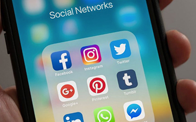 Phone screen with social media icons